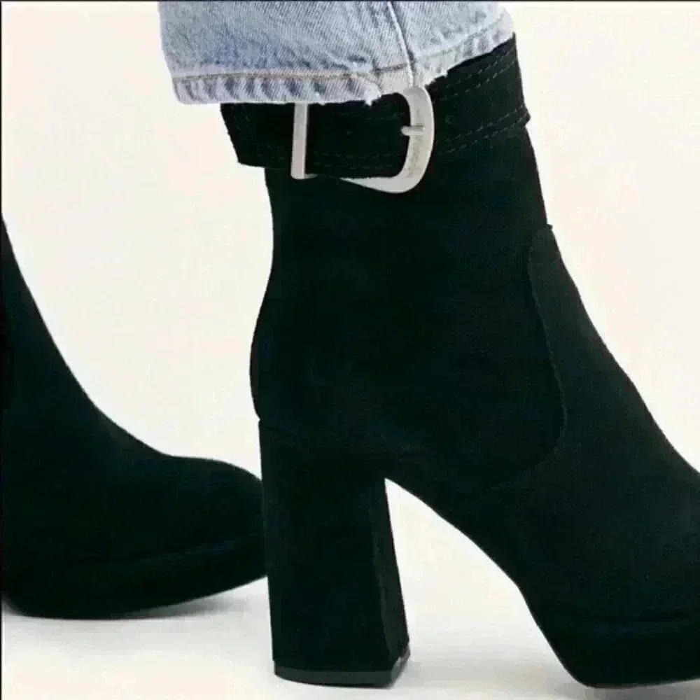 Free People women’s suede boots.